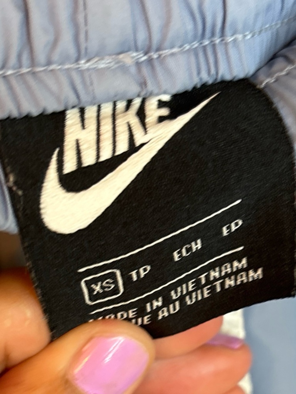 Nike Blue Two-Tone Athletic Shorts with Neon Yellow Logo - Picture 2 of 3